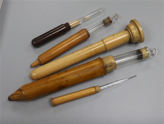 A collection of treen medical containers